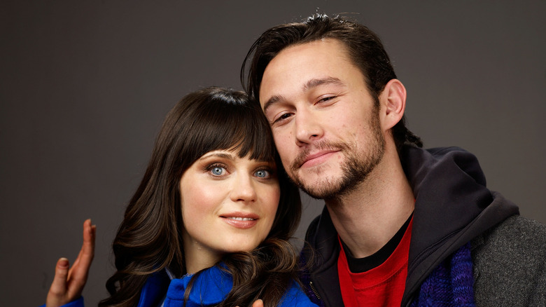 Zooey Deschanel and Joseph Gordon-Levitt smiling