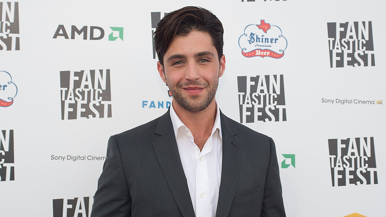 Josh Peck wearing suit