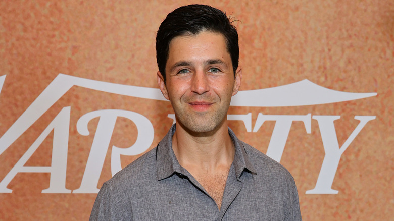 Josh Peck in front of Variety logo