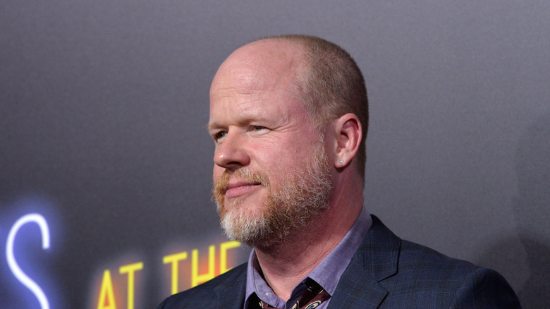 Joss Whedon poses for a picture