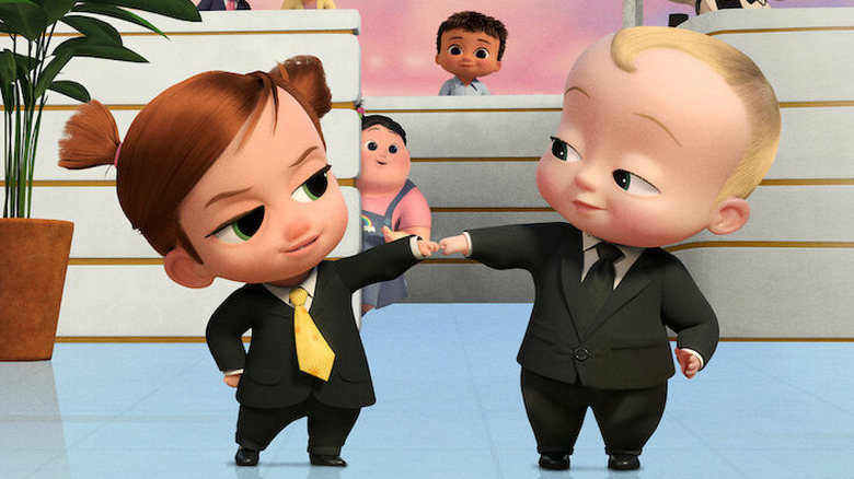 Boss Baby and Tina fist-bumping