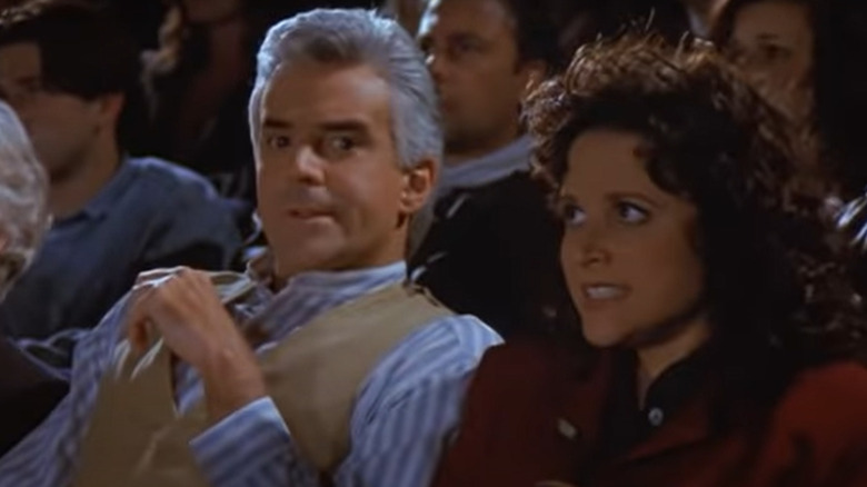 Elaine grimaces next to Peterman