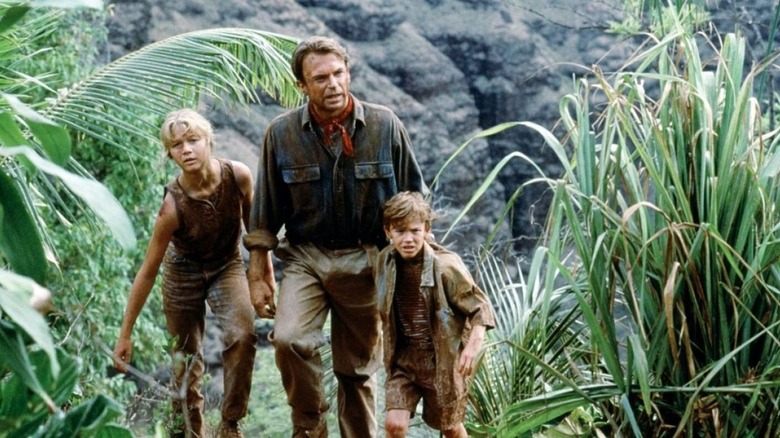 Sam Neill guiding youngsters in Jurassic Park