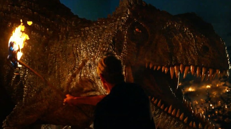 Ian waves torch at the Giganotosaurus