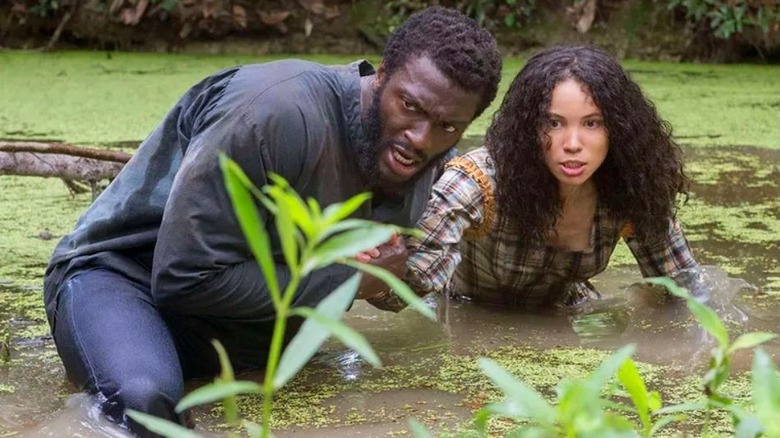 Jurnee Smollett wades through swamp