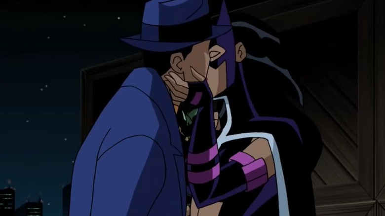 Question and Huntress kissing