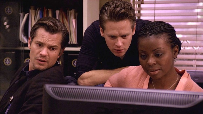 Raylan, Rachel, and Gutterson looking at a computer