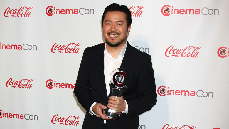 Justin Lin receiving an award