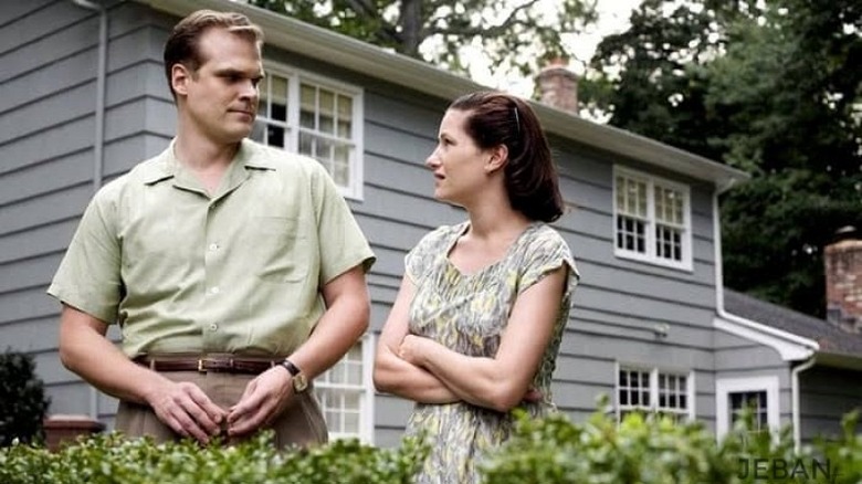 Kathryn Hahn and David Harbour stare at each other