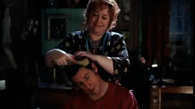 Mama Boucher combs Bobby's hair