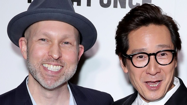 Ke Huy Quan and Jeff Cohen at a premiere