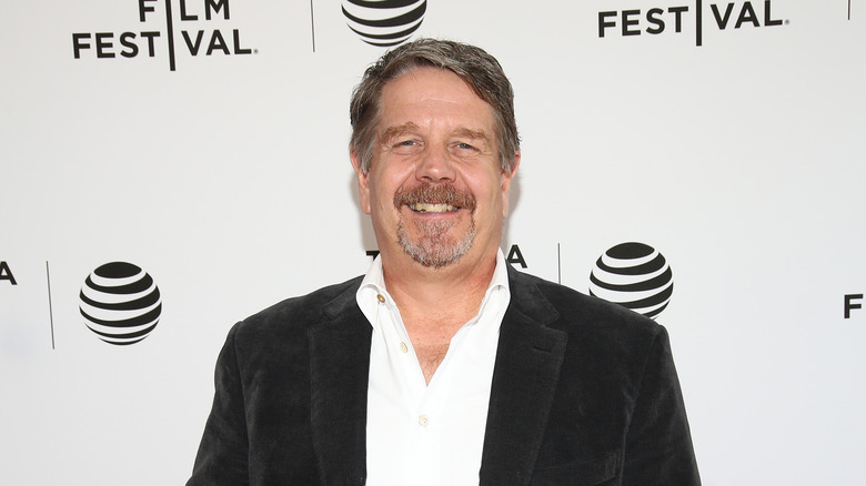 John Wells smiling