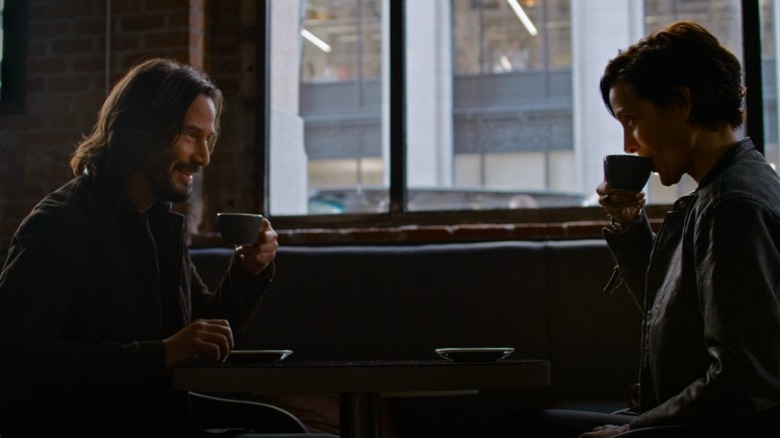 Neo and Trinity drinking coffee The Matrix Resurrections 