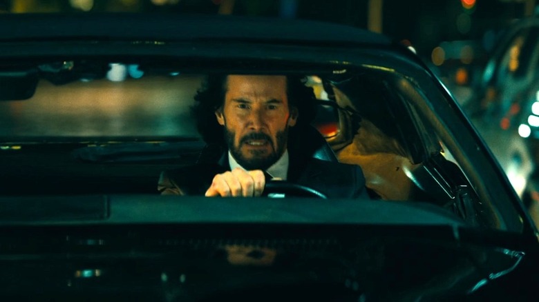 John Wick driving a car