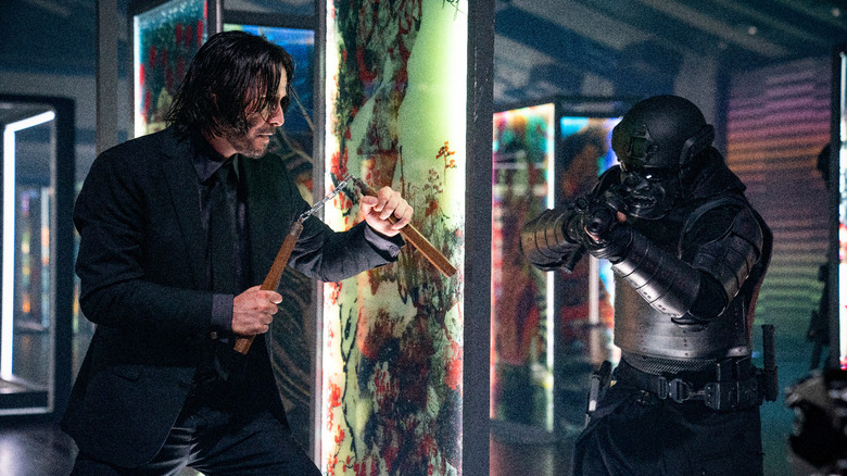 John Wick battling assassin