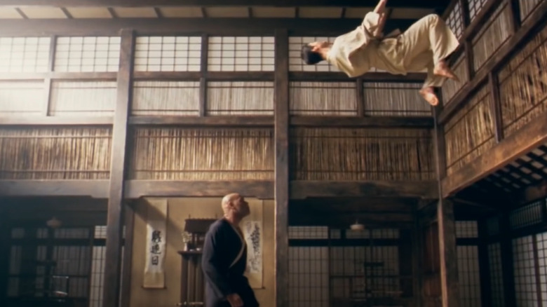 Neo and Morpheus training in the dojo