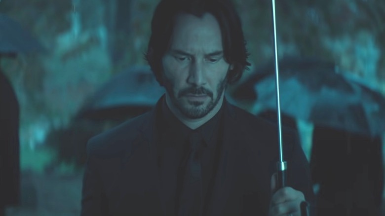 John Wick at his wife's funeral