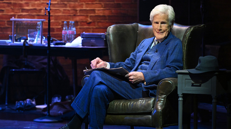 Keith Morrison sitting on a set 