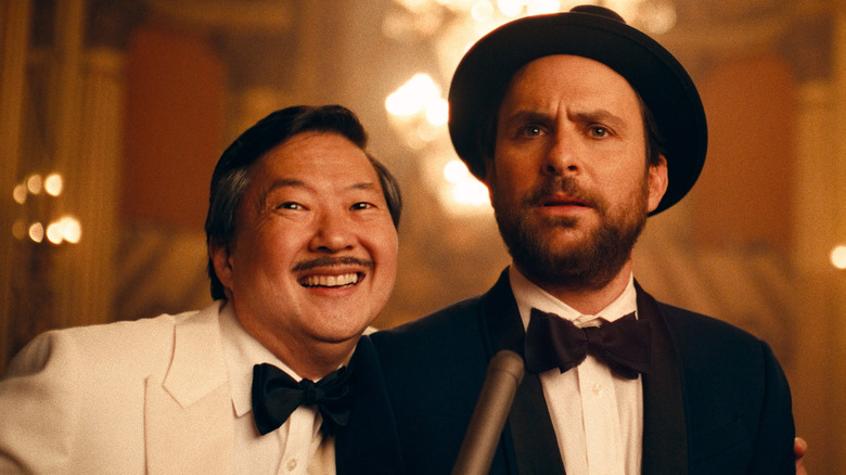 Ken Jeong smiling with Charlie Day