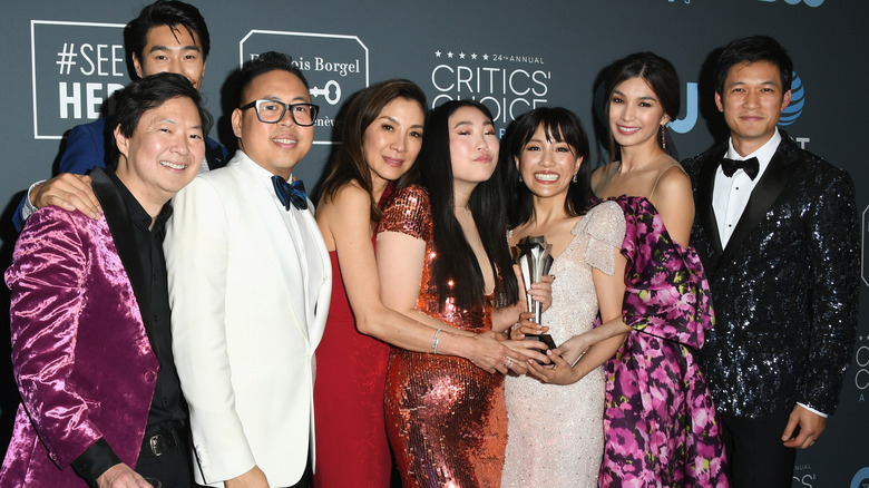 Ken Jeong posing with Crazy Rich Asians cast