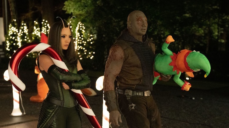 Mantis and Drax standing with holiday decorations