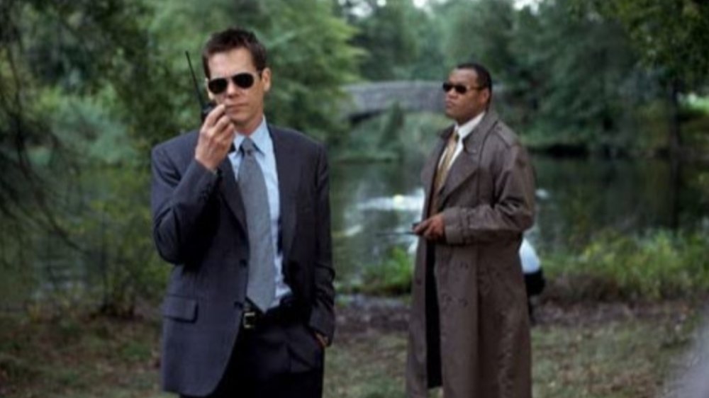 Kevin Bacon as Detective Sean Devine and Laurence Fishburne as Detective Sergeant Whitey Powers in Mystic River