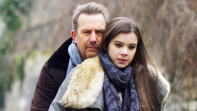 Costner and Steinfeld on a bike