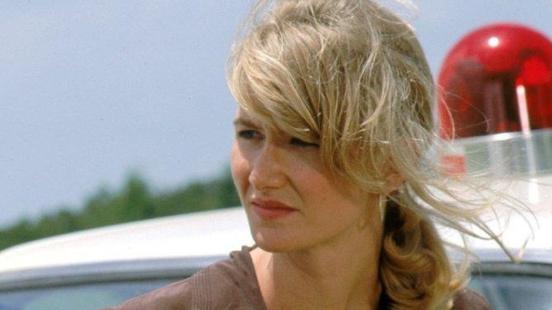 Laura Dern looks left