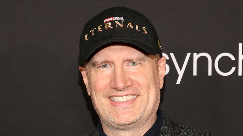 Kevin Feige smiles at the premiere of Eternals