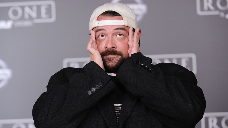 Kevin Smith covering his ears