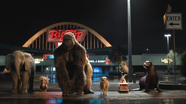 Ivan and his animal pals preparing to cross a street in "The One and Only Ivan" (2020)