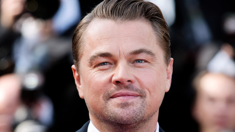 Leonardo DiCaprio poses at event 