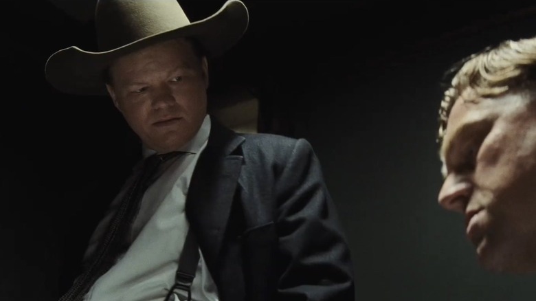 Jesse Plemons interrogates Leonardo DiCaprio