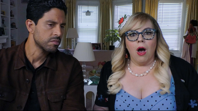 Luke Alvez looking serious and Penelope Garcia looking shocked in Criminal Minds: Evolution