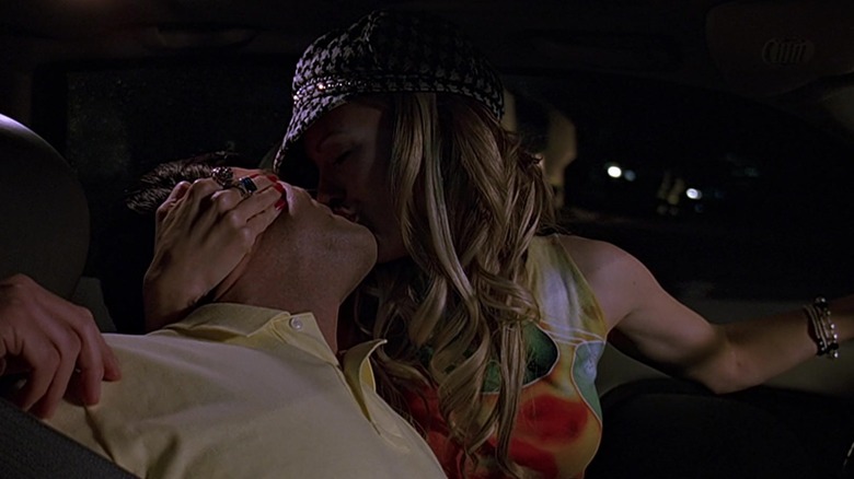 Steve Carell kissing Leslie Mann in a car