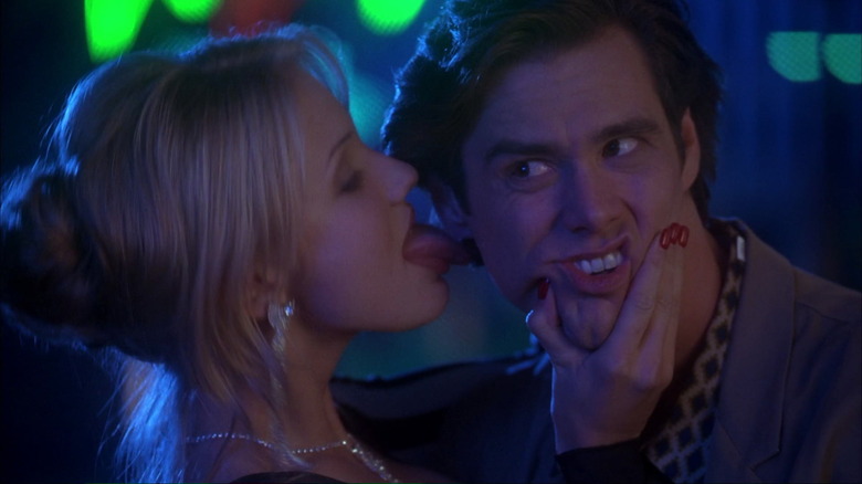 Cameron Diaz licking Jim Carrey's ear