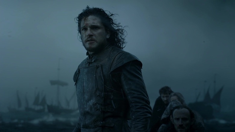 Jon Snow standing on boat