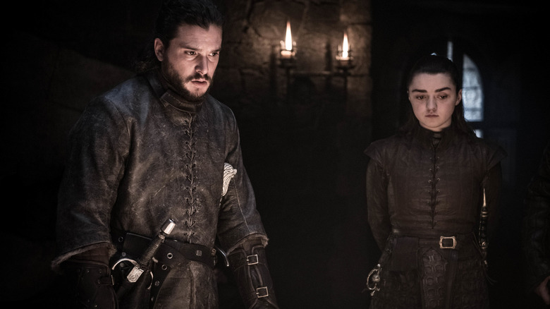 Kit Harington as Jon and Maisie Williams as Arya looking down