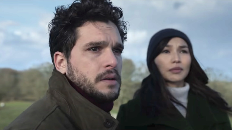 Kit Harington and Gemma Chan look worried