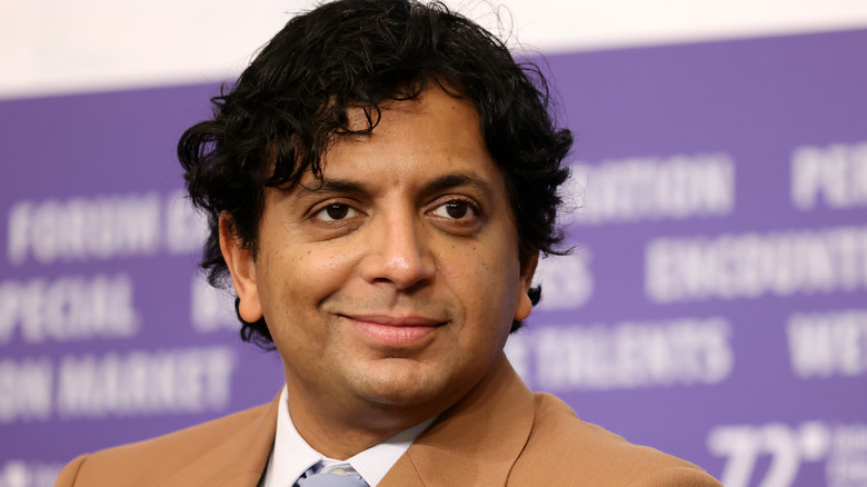 M. Night Shyamalan smiling