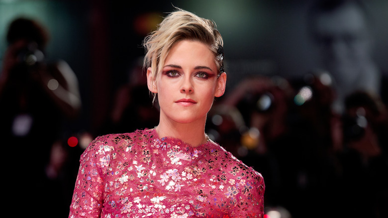 Kristen Stewart with short hair and pink dress