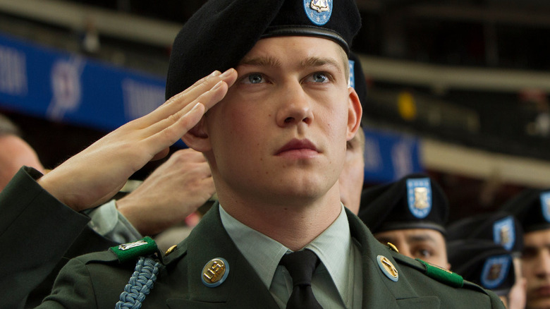 Joe Alwyn saluting before a game