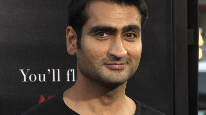 Kumail Nanjiani Torso Black Background