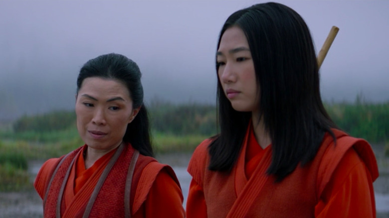 Nicky standing with Pei-Ling in the first season of Kung Fu