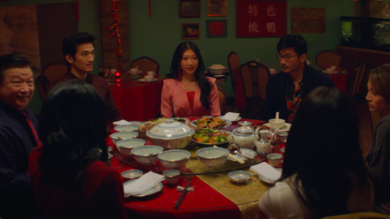 Althea and her family having dinner together at the Shens' restaurant