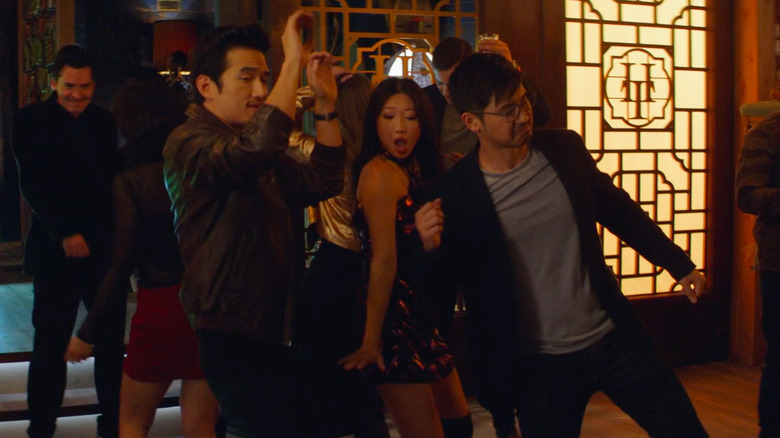 Dennis, Althea, and Ryan dancing in Kung Fu