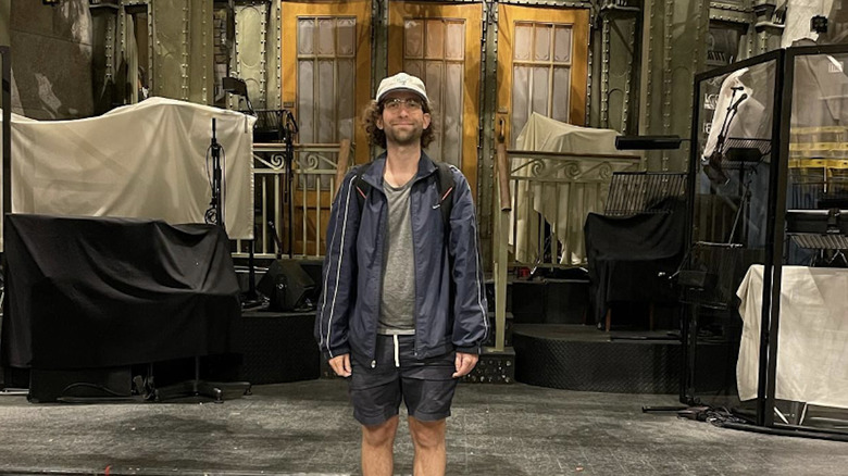 Mooney standing on SNL stage