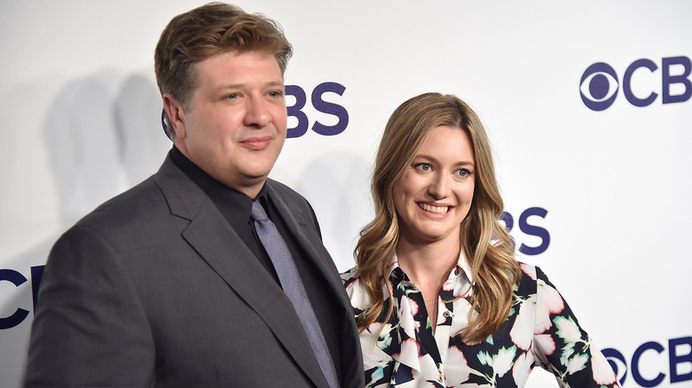 Lance Barber and Zoe Perry smiling at an event