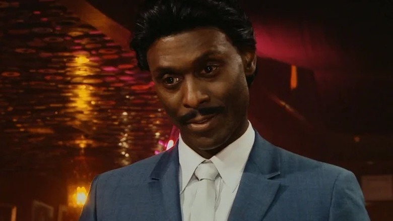 Lance Reddick with a mustache