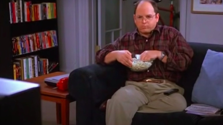  George Costanza eating popcorn on couch